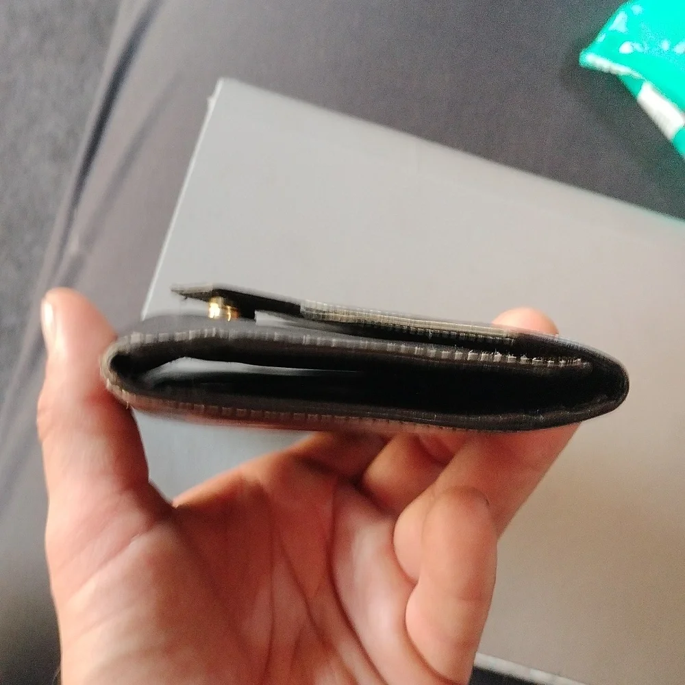 Christian Dior Vintage black leather wallet.